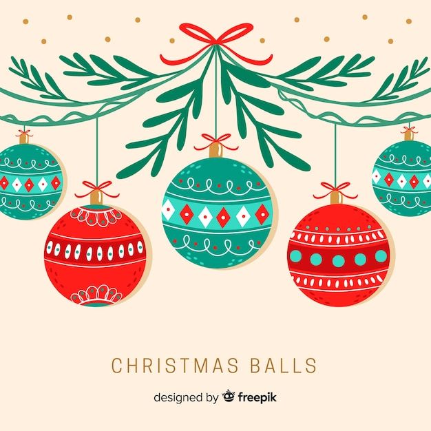 christmas balls hanging from a tree branch