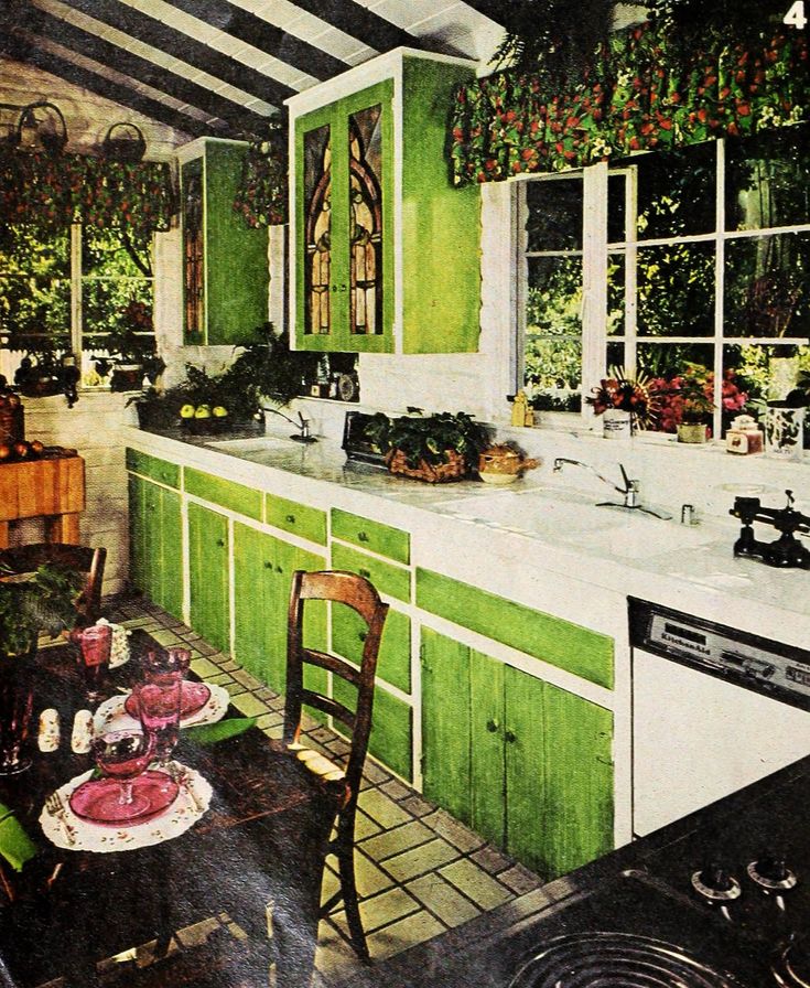 an old kitchen with green cabinets and white counter tops is featured in this vintage magazine