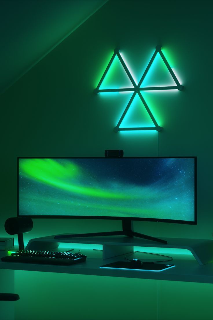 Nanoleaf Lines RGB light bars in a gaming room above the monitor Nanoleaf Lines, Music Visualization, Light Bars, Apple Homekit, Screen Mirroring, Google Assistant, Led Light Bars, Desk Setup, Smart Lighting