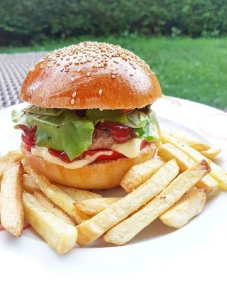 a hamburger and french fries on a plate