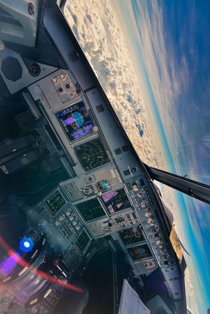 the view from inside an airplane looking out at the earth