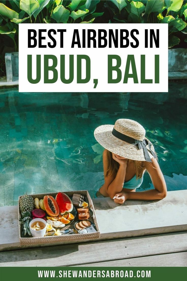 a woman sitting on the edge of a pool with food in front of her and text overlay reading best airbnbs in ubud, bali