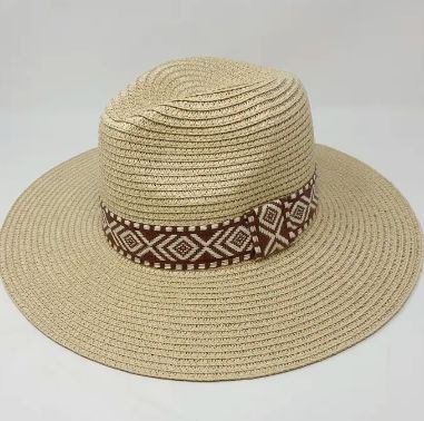 Panama hat with Aztec woven band around brim. So boho and stylish with this unique pattern details. One size with adjustable string overall dimension: Approximately 15” x 15” x 5” Inner perimeter is about 22”, slightly stretchable 100% Paper Trendy Brown Straw Hat For Festivals, Bohemian Brown Fedora For Beach Season, Bohemian Braided Fedora Hat, Bohemian Adjustable Straw Fedora, Adjustable Straw Bohemian Fedora, Bohemian Braided Fedora Sun Hat, Casual Braided Straw Hat For Festival, Bohemian Braided Hat With Curved Brim, Bohemian Braided Curved Brim Hat