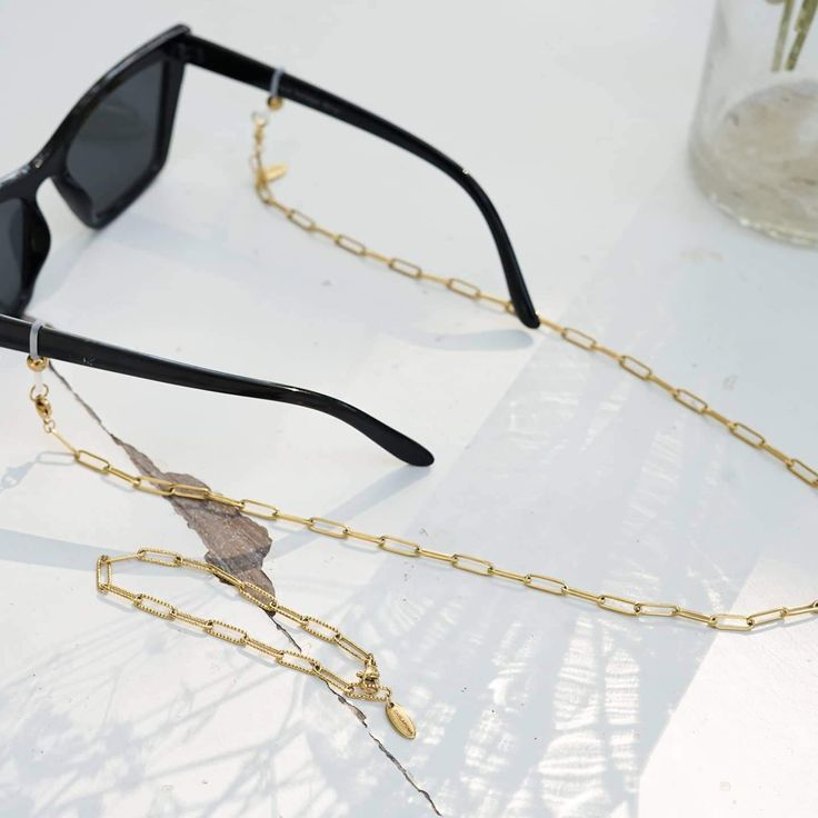 Statement sunglasses chain part of the Anahi Collection, a versatile 3 in 1 chain, can be used for sunglasses, masks or as a regular necklace, made of 14k gold plated stainless steel. Available in gold ot silver color. MEASUREMENTS | Chain length 22" Adjustable Gold Chain Glasses Chains As A Gift, Adjustable Gold Chain Link Necklace, Trendy Adjustable Gold Glasses Chain, Trendy Gold Chain Glasses Chain For Gift, Trendy Gold Chain Glasses Chains As Gift, Minimalist Gold Glasses Chains For Everyday, Trendy Gold Glasses Chain For Gift, Adjustable Cable Chain Necklace, Adjustable Gold Glasses Chains For Gift