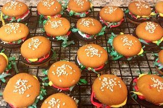 there are many hamburgers on the cooling rack