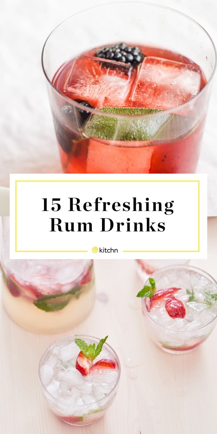 some drinks with ice and strawberries in them on a white wooden table text overlay reads 15 refreshing rum drinks