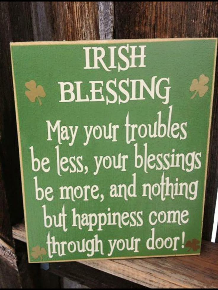 a sign that says irish blessing may your troubles be less, your blessing be more, and nothing but happiness come through your door