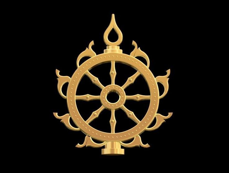 the wheel of life is shown in gold on a black background, and it appears to be made out of metal