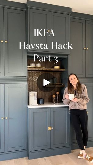 a woman standing in front of a kitchen cabinet with the words ikea havsta lack part 3