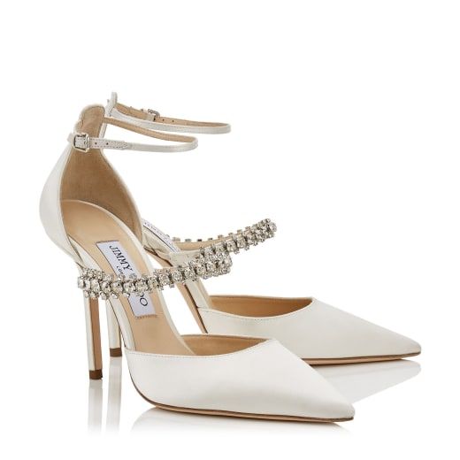 Ivory Satin Pointy Toe Pumps with Crystal Strap | BOBBIE 100 | Cruise 19 | JIMMY CHOO Jimmy Choo Wedding Shoes, Bronze Heels, Hak Tinggi, Jimmy Choo Bridal, Sparkly Heels, Jimmy Choo Heels, Wedding Heels, Bride Shoes, Footwear Design Women