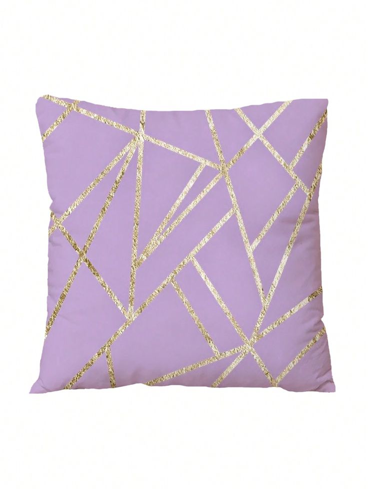 a purple pillow with gold lines on it