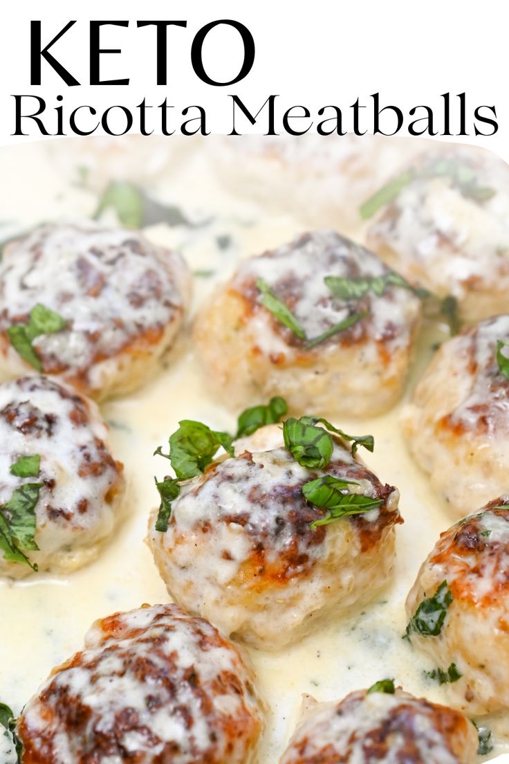 some meatballs are covered in sauce and garnished with parsley