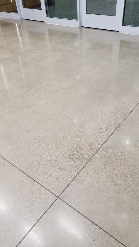 the floor is clean and ready to be used in this building's entryway