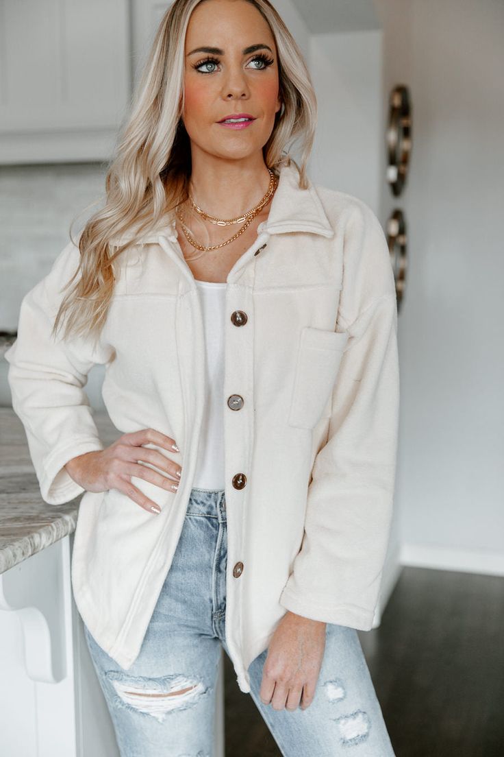 Invite this timeless layering piece into your wardrobe in our "Strike A Cord" button down shirt jacket. This cream shacket is secured with front button closures. Designed with bust pockets and button cuffs. Styled with the " Taryn" high rise mom jeans for a sleek effortless look. PRODUCT DETAILS: Front Button Closures Not Lined Colors May Vary Patterns May Vary CONTENT + CARE: Machine Wash Cold, Tumble Dry Low SIZE + FIT: Model: Model is 5'7" and wearing a Size Medium Fit: This garment runs smal Chic Button-up Outerwear With Buttoned Pockets, Everyday Long Sleeve Single Breasted Utility Jacket, Everyday Single-breasted Utility Jacket With Long Sleeves, Everyday Collared Outerwear With Buttoned Pockets, Cream Single-breasted Button-up Outerwear, Everyday Long Sleeve Utility Jacket With Buttoned Pockets, Everyday Outerwear With Lapel Collar And Buttons, Everyday Outerwear With Buttons And Lapel Collar, Everyday Winter Shacket With Snap Buttons