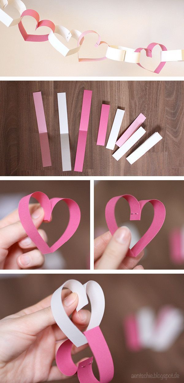 the steps to make paper hearts that are cut out of construction paper and glued together