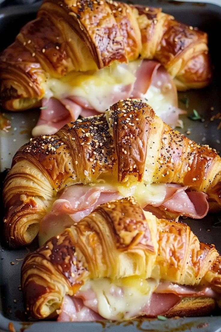 ham and cheese croissants in a baking pan