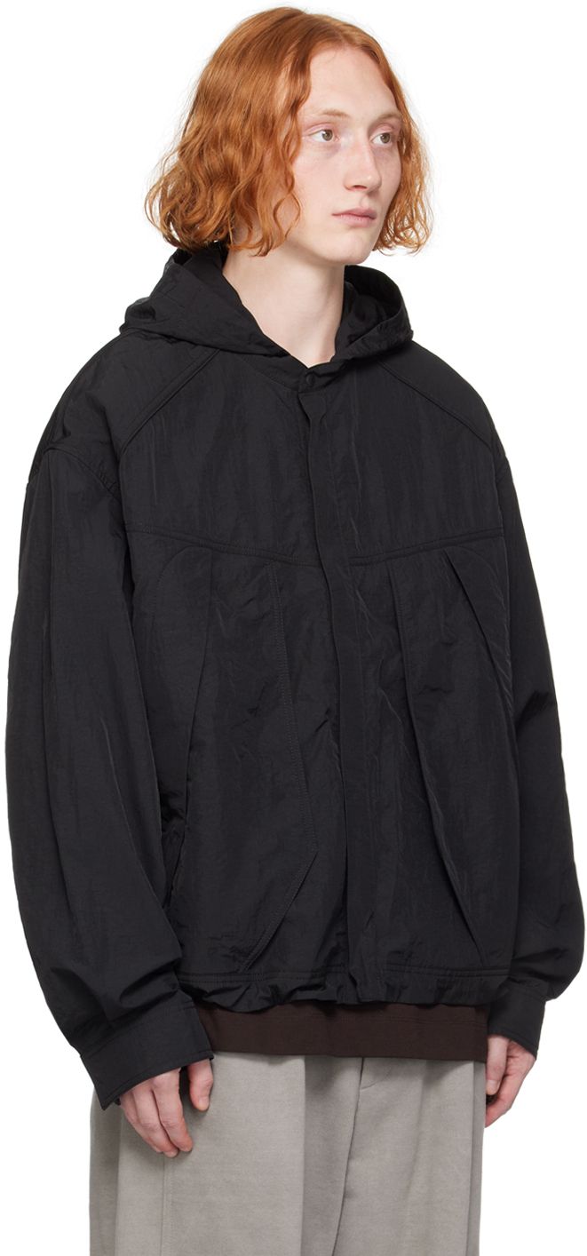 Nylon taffeta jacket. · Bungee-style drawstring at hood · Concealed zip closure · Zip pockets · Concealed bungee-style drawstring at hem · Dropped saddle shoulders · Adjustable single-press-stud barrel cuffs · Unlined Supplier color: Black Hooded Nylon Outerwear With Drawstring, Nylon Hooded Outerwear With Drawstring, Nylon Outerwear With Zip Cuffs For Streetwear, Oversized Windbreaker With Detachable Hood, Nylon Hooded Jacket With Functional Drawstring For Streetwear, Techwear Style Nylon Windbreaker With Functional Drawstring, Casual Nylon Hooded Jacket With Zip Cuffs, Techwear Nylon Windbreaker With Functional Drawstring, Functional Hooded Outerwear With Zip Cuffs