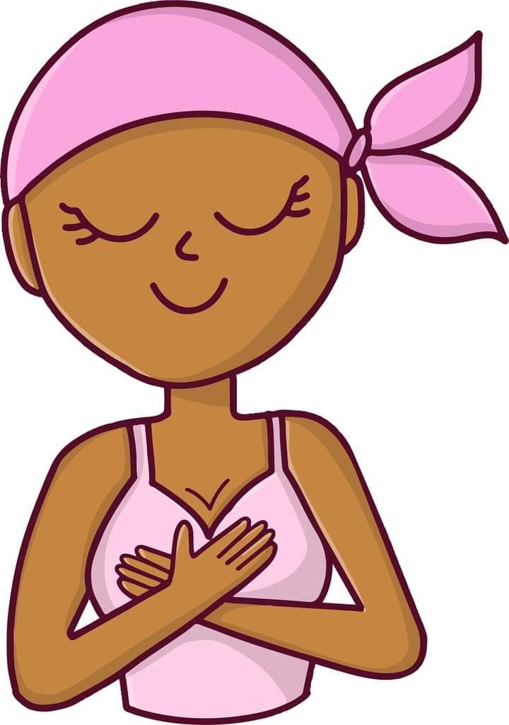 a woman wearing a pink towel and holding her hands together in front of her chest