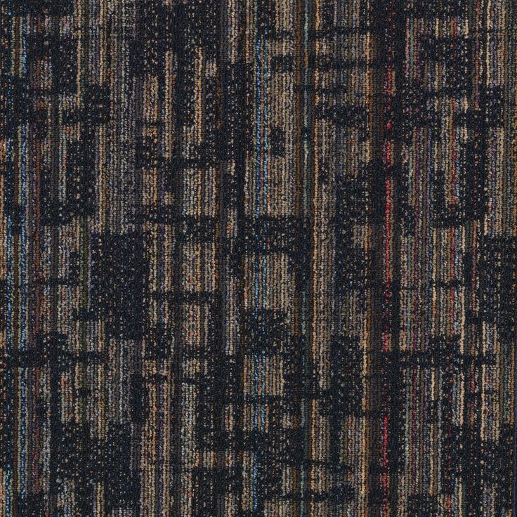 a black and brown rug with different colored lines