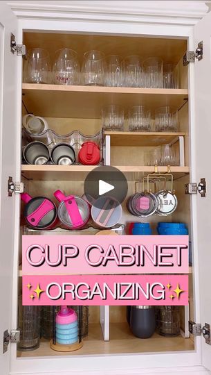 an organized cabinet with cups, bowls and other kitchen items in it that says cup cabinet organizing