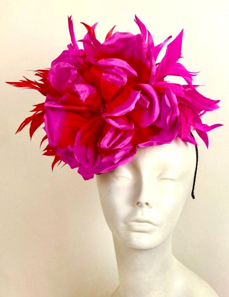 "Red and Fuchsia Fascinator-Wedding- Hot pink Headpiece- Cocktail Hat- Polo match  Hello,          One of a kind- ships in 1 business day. This red and magenta feather fascinator is about 11\" round.  Silk flower is about 8\" wide. It is attached to a black satin adjustable headband that is wrapped in satin and is very comfortable.  On a black straw base.   -------------------------------------------------- I ship US Postal Service.           USA DOMESTIC CHOICES (From mailed date in business days) First Class:  Arrives 3-6 days. (No insurance) Priority:        Arrives 1-4 days.  (Insurance included)                   Express:       Arrives 1-2 days.  (Insurance included)      INTERNATIONAL CHOICES (From mailed date in business days) First Class:  Arrives 10-26 days. Priority:        Arriv Pink Carnival Headpieces, Formal Pink Hair Accessories, Pink Headband Fascinator For Carnival, Pink Carnival Headband Fascinator, Pink Headpieces For Carnival Party, Pink Flower Fascinator For Wedding, Pink Carnival Headpieces For Party, Pink Headband Mini Hats For Carnival, Pink Flower Headpiece For Wedding