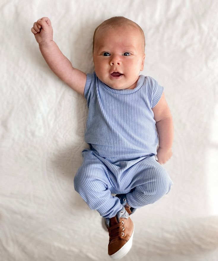 Fitted Blue Short Sleeve Bodysuit For Playtime, Fitted Blue Bubble Romper For Playwear, Blue Short Sleeve Bodysuit For Loungewear, Blue Sleeveless Bodysuit For Playwear, Sleeveless Blue Bodysuit For Playwear, Blue Sleeveless Playwear Bodysuit, Blue Sleeveless Onesie For Playtime, Fitted Sleeveless Blue Onesie, Blue Fitted Sleeveless Onesie