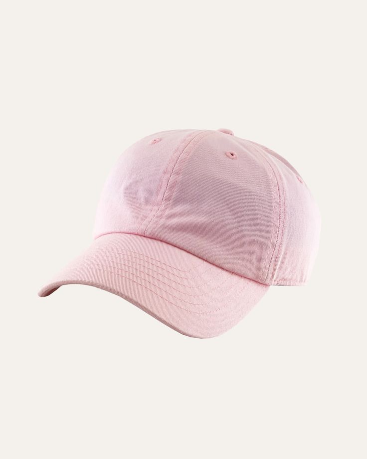 a pink baseball cap on a white background