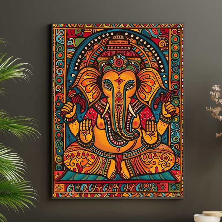 an elephant painting hanging on the wall next to a potted plant