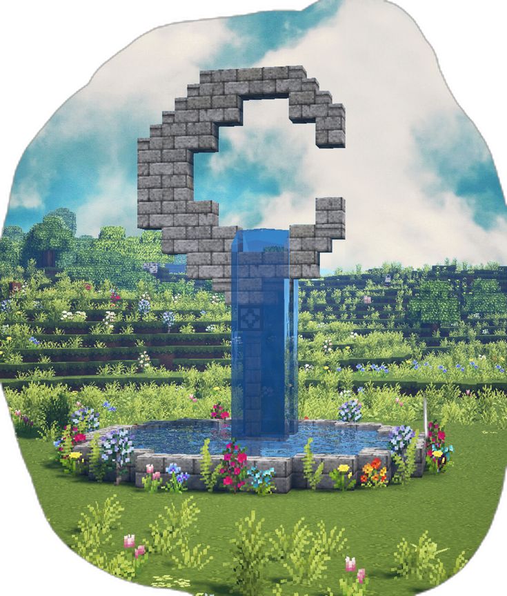 an image of the letter c made out of bricks in a garden with flowers and bushes