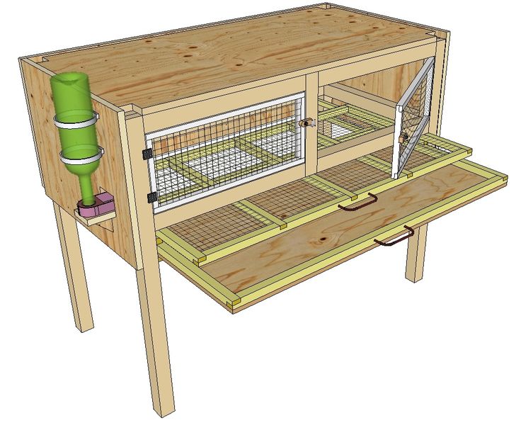 a wooden table with an animal cage on top