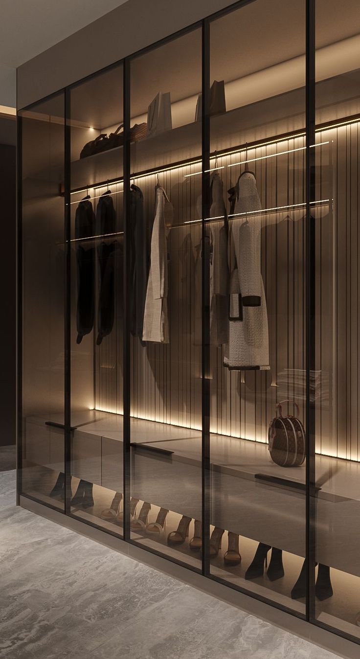 an empty walk - in closet with shoes and handbags on the shelves next to it