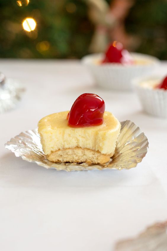 a piece of cheesecake with jelly on top