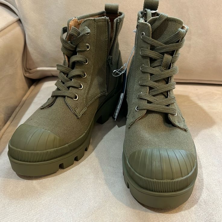 Brand New With Tag, Never Worn, Green, Canvas Combat Booties. Lace-Up With Easy On/Off Zipper In Side. Super Cute For Summer! Casual Khaki Lace-up Combat Boots, Casual Green Boots With Lug Sole, Green Casual Combat Boots With Round Toe, Casual Green Combat Boots With Round Toe, Casual Khaki Combat Boots With Round Toe, Casual Khaki High-top Combat Boots, Casual Medium Width Lace-up Combat Boots, Casual Combat Boots With Flat Heel And Medium Width, Casual Combat Boots High Ankle Medium Width