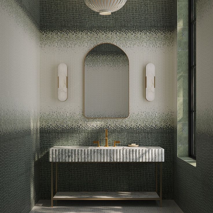 a bathroom with a sink, mirror and two lights on the side of the wall