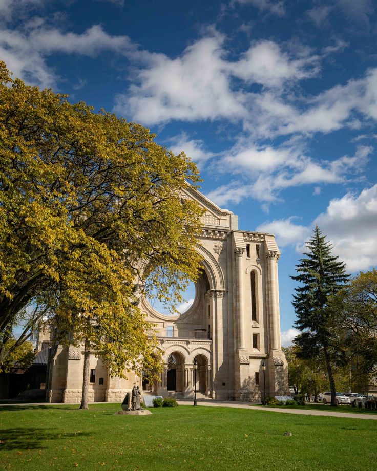 an old church in the middle of a park