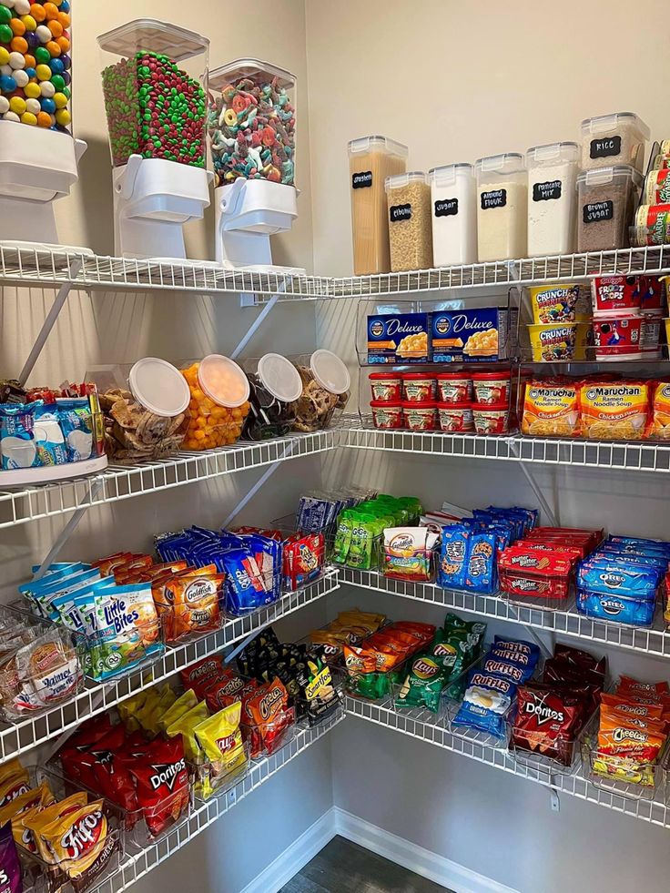 a pantry filled with lots of different types of food and containers on the shelves next to each other