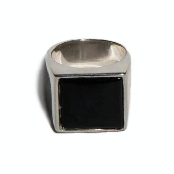 This is our 'Samuel' ring from our flat top Thomas collection. With its flat, square face adorned with a high polished 16x16mm black onyx, the 'Samuel' ring combines practicality and edge. This unisex signet ring is a go-to piece with endless wearability. Onyx is worn to defend against negativity, it has protective energies that are believed to bring rejuvenation, fortify self confidence and responsibility and sharpens your senses. Onyx No two stones are alike Available in Sterling Silver & Yellow Brass Made in New York City Made to order, please allow 5-10 business days for production Note: we suggest that you size up a full size with this style Modernist Rectangular Signet Ring With Polished Finish, Rectangular Modernist Signet Ring With Polished Finish, Modern Signet Ring With Rectangular Stone And Polished Finish, Minimalist Rectangular Onyx Jewelry, Modern Square Signet Ring With Polished Finish, Modern Black Enamel Signet Ring, Modern Black Signet Ring With Polished Edges, Modern Black Jewelry With Rectangular Stone, Modern Onyx Signet Ring For Gift