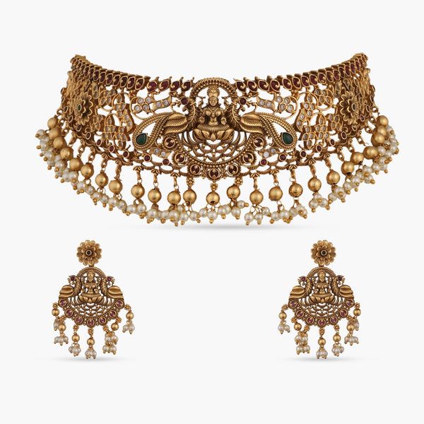 Shop Now: Tarinika's Temple Classic Antique Choker Set Luxury Round Temple Jewelry Sets, Intricate Design Choker For Receptions And Festivals, Intricate Design Choker For Reception And Festivals, Festive Intricate Temple Choker Necklace, Ornate Kundan Necklace With Peacock Design For Wedding, Traditional Kundan Necklace With Peacock Design For Reception, Festival Intricate Choker Temple Necklace, Festival Temple Necklace With Intricate Design, Festive Temple Necklace With Intricate Design Choker