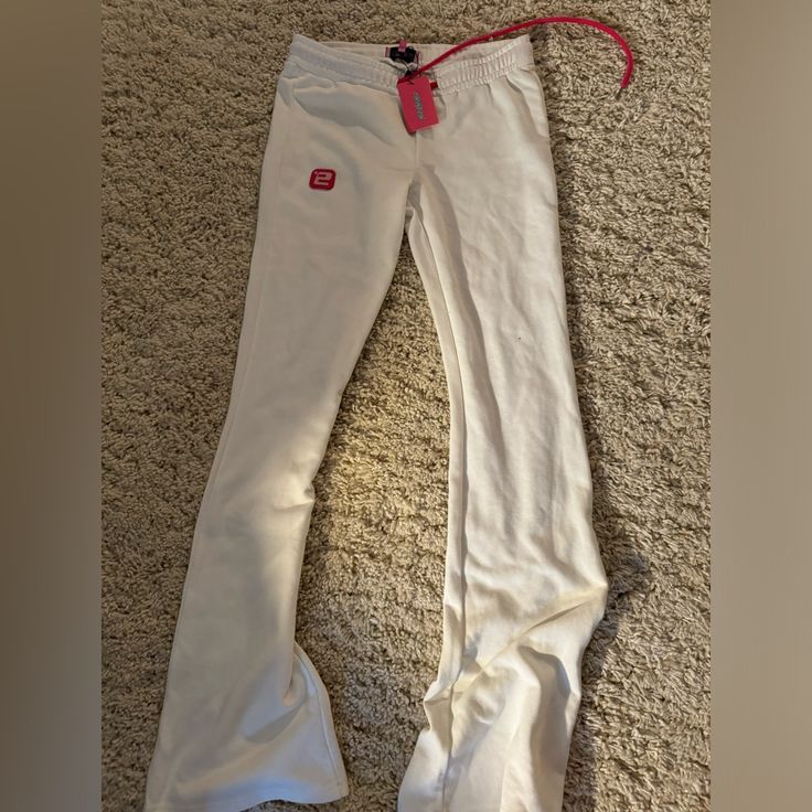 Perfect Condition. Never Worn. Still Has Tags. 90s Style White Streetwear Pants, White 90s Style Cotton Pants, White Cotton 90s Style Pants, Trendy White Full-length Sweatpants, Trendy White Full Length Sweatpants, White Stretch Trendy Sweatpants, White Fitted Sweatpants For Loungewear, Trendy White Stretch Sweatpants, Fitted White Sporty Sweatpants