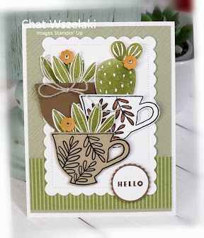 a close up of a card with a plant in a cup on it and the words hello