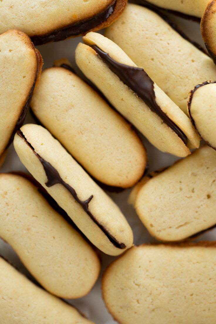 some cookies with chocolate icing on them