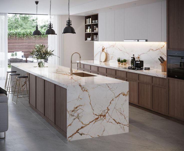 a large kitchen with marble counter tops and wooden cabinets, along with bar stools