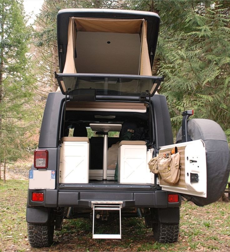 the back end of a truck with an open trunk