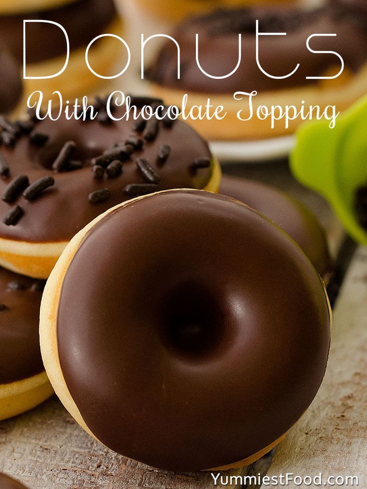 chocolate covered donuts with chocolate toppings on top