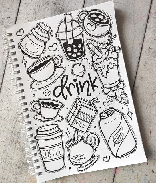 a notebook with doodles on it and the words drink written in black ink