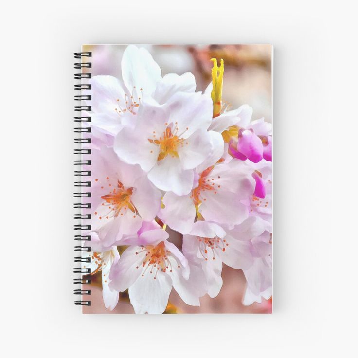 pink and white flowers with yellow stamens on the petals spiral notebook journal - style cover