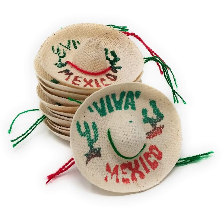 several mexican sombrero hats are stacked on top of each other with the words mexico printed on them