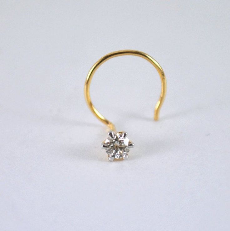 "Dainty genuine diamond nose pin, hand crafted in 14k solid gold, these C & L wire studs are perfect for any occasion. An intrinsic part of your everyday, they can be worn in multiple types of piercings. * Diamond Wt : 0.01ct to 0.10ct (for bigger sizes please message) 1) - 0.01 ct (1.4 mm) 2) - 0.02 ct (1.7 mm) 3) - 0.03 ct (1.9 mm) 4) - 0.04 ct (2.1 mm) 5) - 0.05 ct (2.3 mm) 6) - 0.06 ct (2.5 mm) 7) - 0.07 ct (2.6 mm) 8) - 0.08 ct (2.7 mm) 9) - 0.09 ct (2.8 mm) 10) - 0.10 ct (2.9 mm) MODEL Classic Round Nose Studs For Gifts, 14k Gold Nose Rings For Wedding, 14k Gold Nose Studs With Prong Setting Gift, 14k Gold Prong Setting Nose Studs For Gift, Yellow Gold Nose Rings With Prong Setting, Minimalist Yellow Gold Round Nose Studs, Dainty Nose Rings With Prong Setting As Gift, Yellow Gold Nose Studs With Prong Setting For Gift, Yellow Gold Nose Studs With Prong Setting