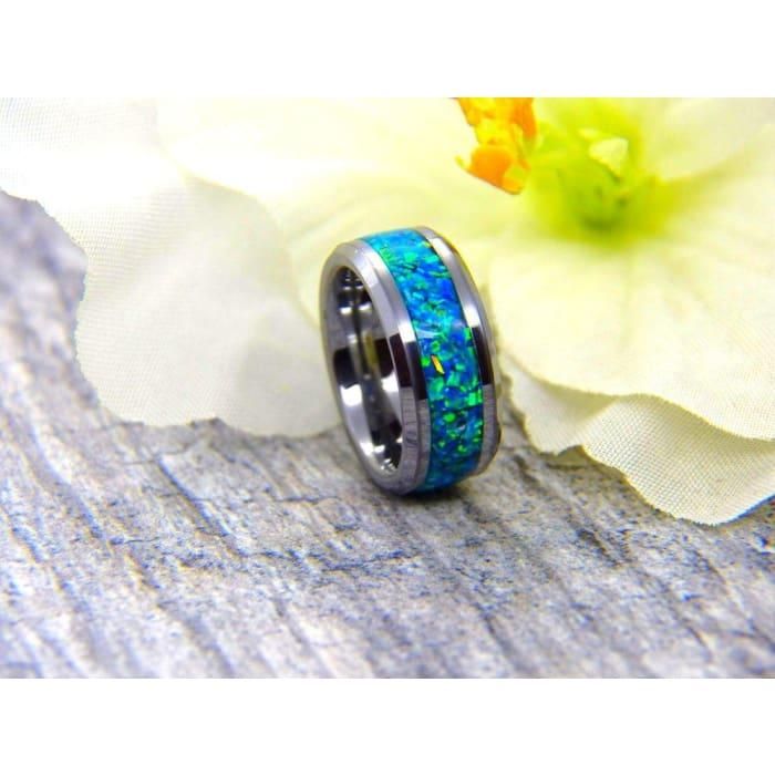 Bring a little fun to your everyday accessories with the addition of this stylish everyone ring. Get it set with a peacock blue inlay for a sophisticated look. Mark the occasion of an engagement with this elegant and refined gift. comes in 6mm standard women’s width or 8mm standard men's width to ensure your ring is comfortable but won't slip off. This ring is custom-made to truly reflect your unique style. Available in a gorgeous black ceramic ring core for scratch resistance. This stylish peac Ceramic Ring, Yellow Opal, The Peacock, Ceramic Rings, Tungsten Ring, Everyday Accessories, Ring Sizer, Peacock Blue, Black Ceramic