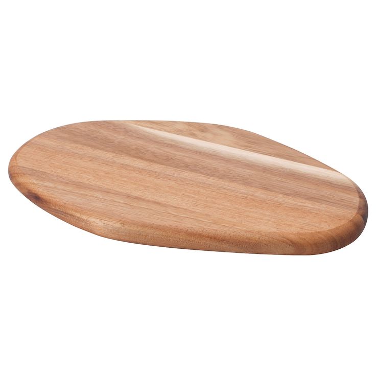 a wooden cutting board on a white background